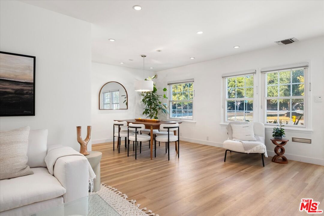 10944 Stever Street Culver City, CA 90230 - Photo 5 of 25 a living room with furniture and a wooden floor