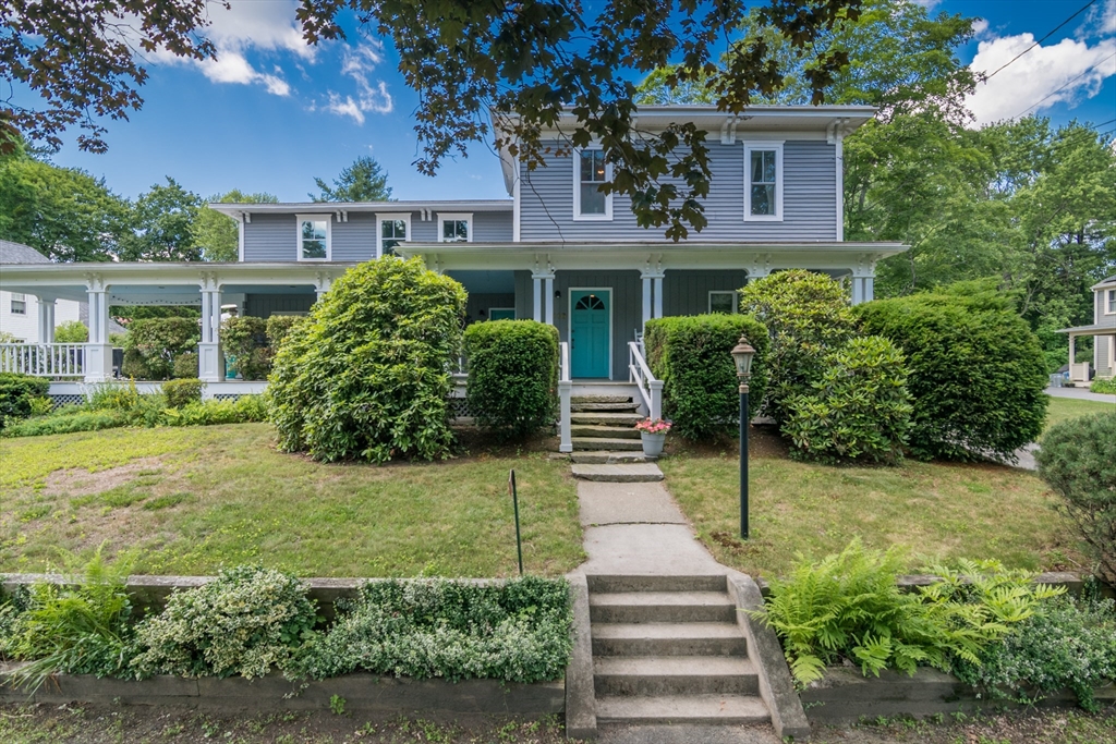 116 High Street Amherst, MA 01002 - Photo 2 of 42 a front view of a house with a garden