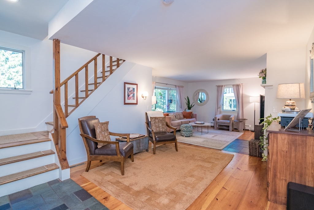 116 High Street Amherst, MA 01002 - Photo 3 of 42 a living room with furniture and a wooden floor