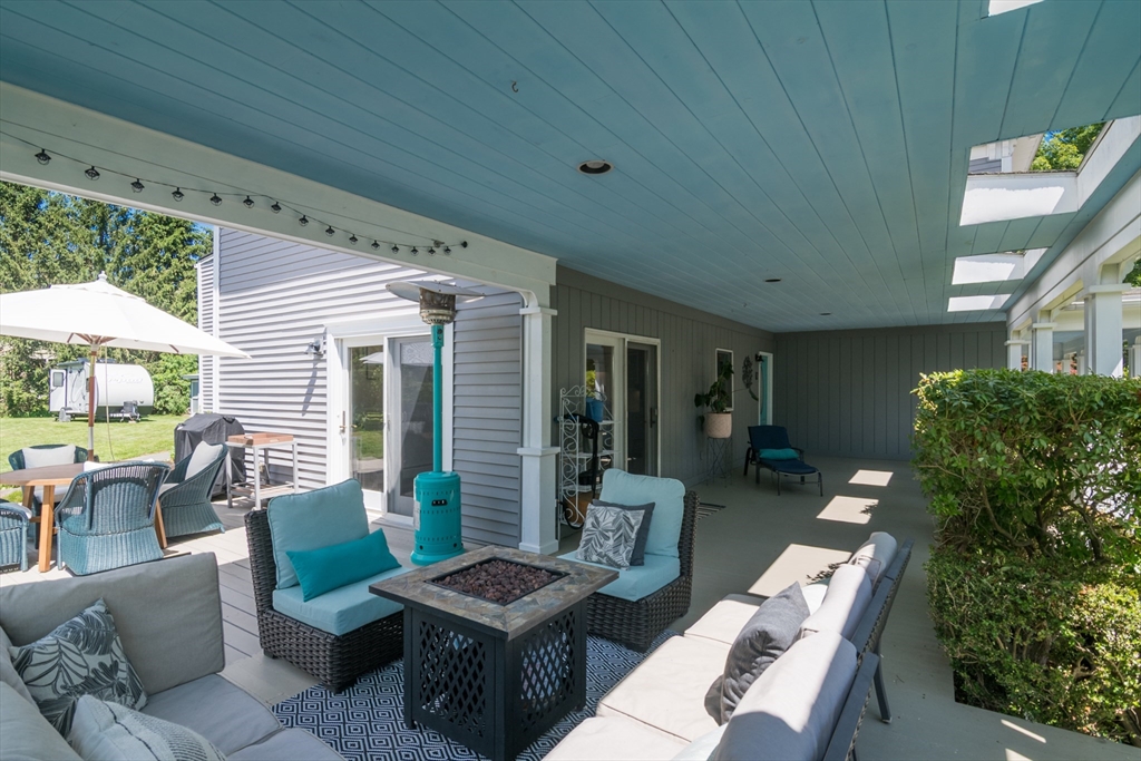 116 High Street Amherst, MA 01002 - Photo 37 of 42 a outdoor living space with furniture and potted plants