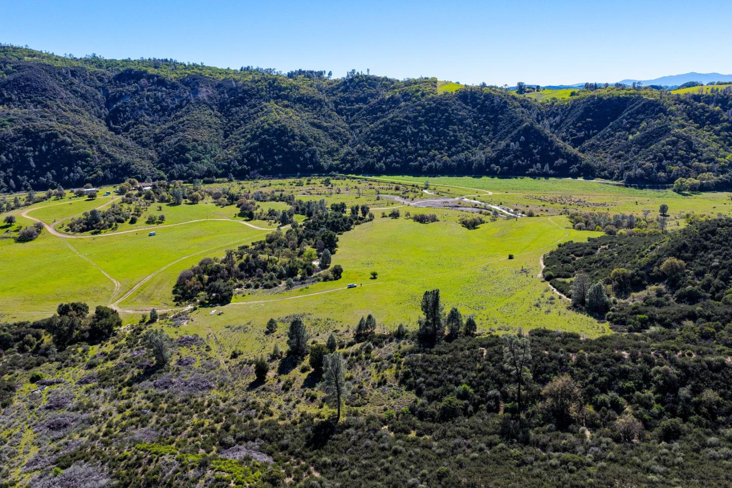 0 Coalinga Road Paicines, CA 95043 - Photo 5 of 14 a view of a lake with a beach