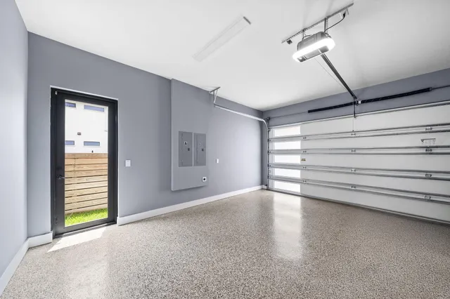 a view of a patio with table and chairs