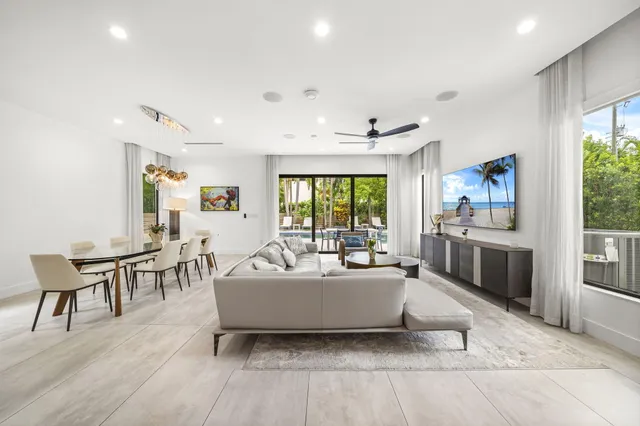 a living room with furniture and white walls