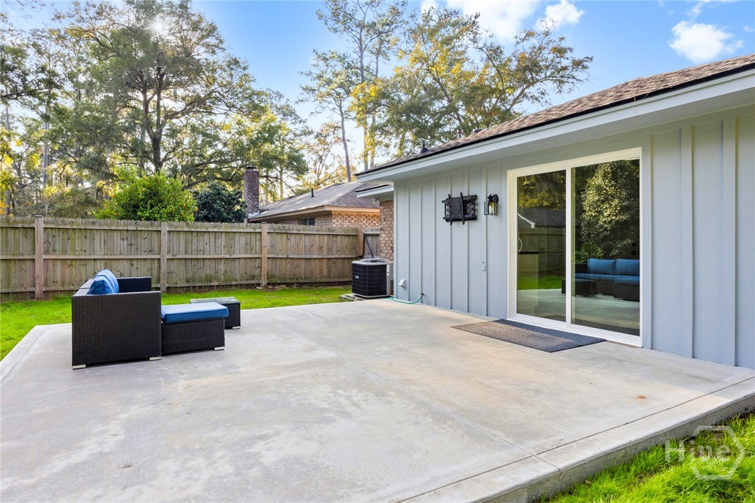 1106 Oakleaf Drive Savannah, GA 31410 - Photo 28 of 30 Large patio area with TV mount for outdoor entertainment