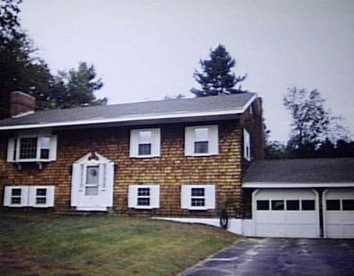 37 Rangeley Road Lunenburg, MA 01462 - Photo 1 of 1 a front view of a house with a garden
