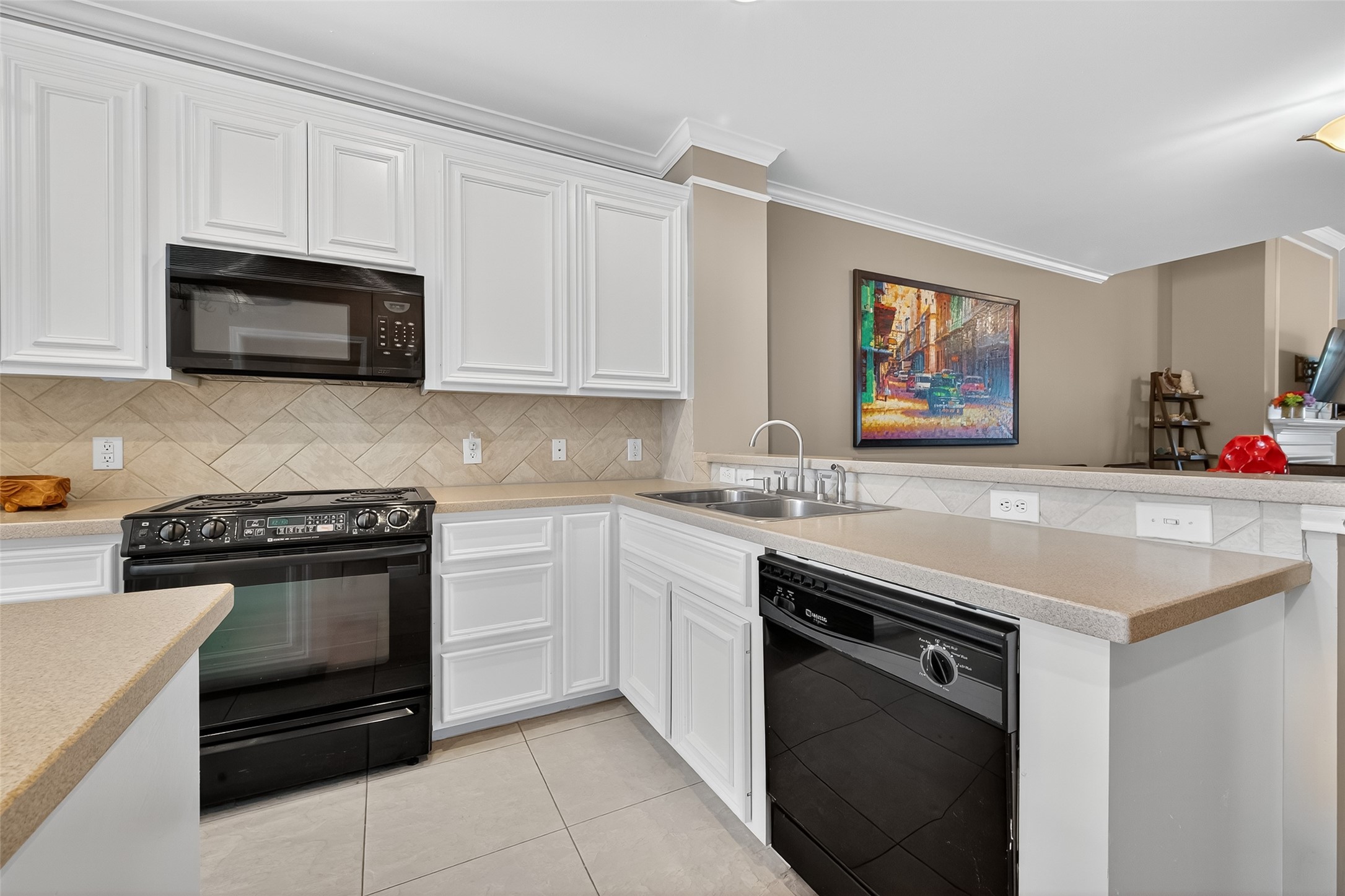 2913 West Dallas Street Houston, TX 77019 - Photo 15 of 34 a kitchen with stainless steel appliances granite countertop a stove and a microwave