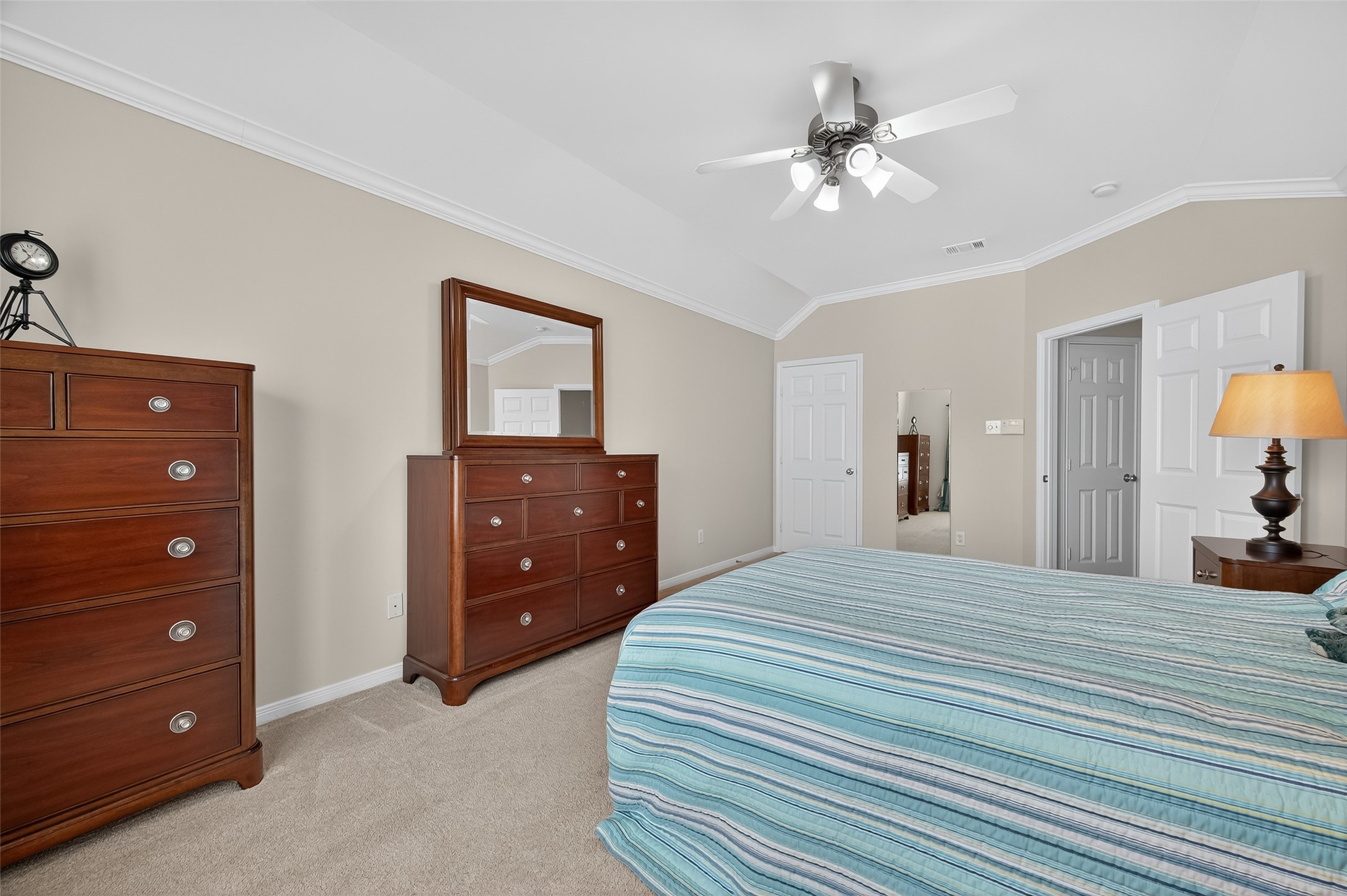 2913 West Dallas Street Houston, TX 77019 - Photo 26 of 34 a bedroom with a bed and a dresser