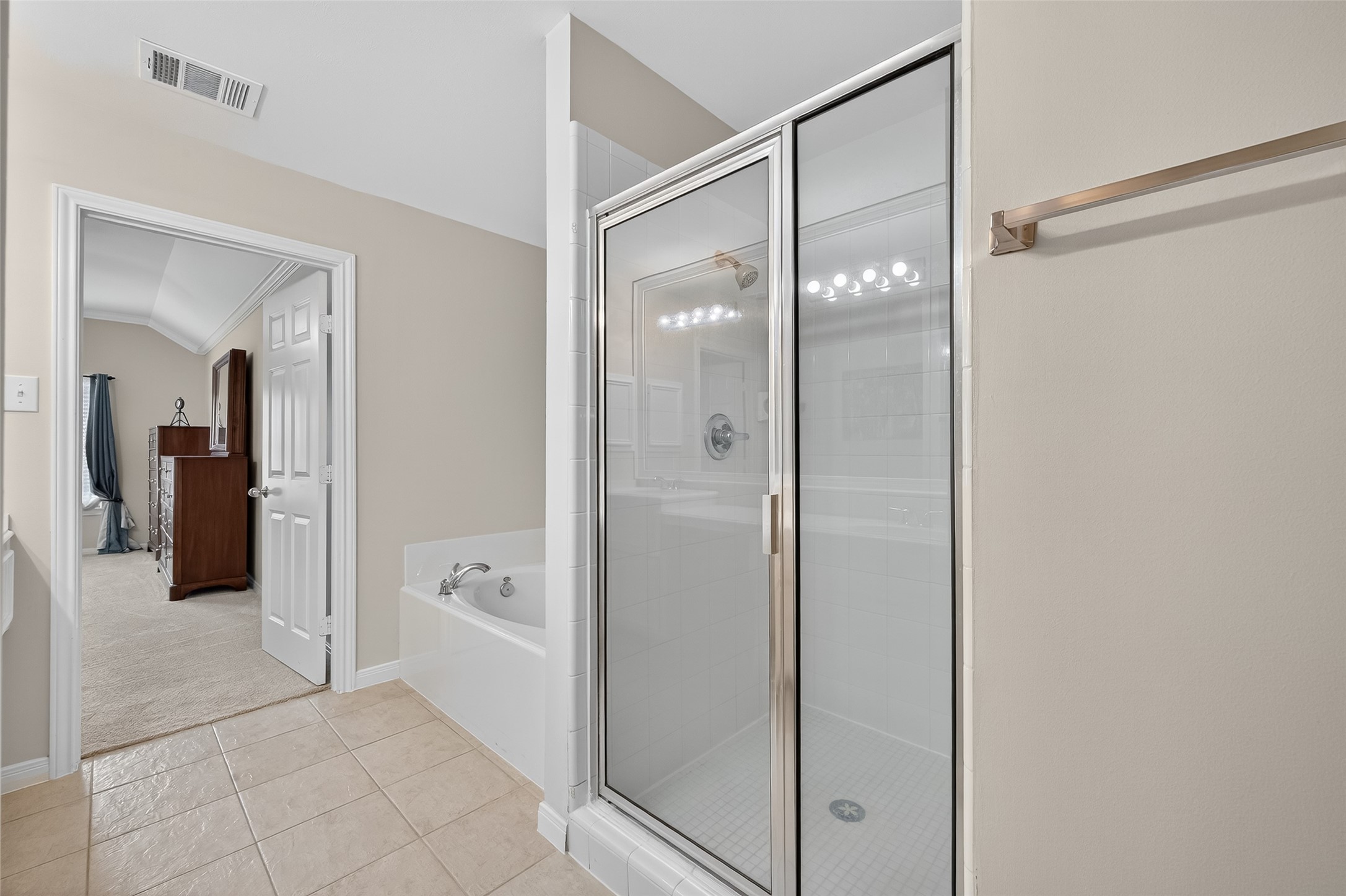 2913 West Dallas Street Houston, TX 77019 - Photo 30 of 34 a bathroom with a glass shower door and a shower