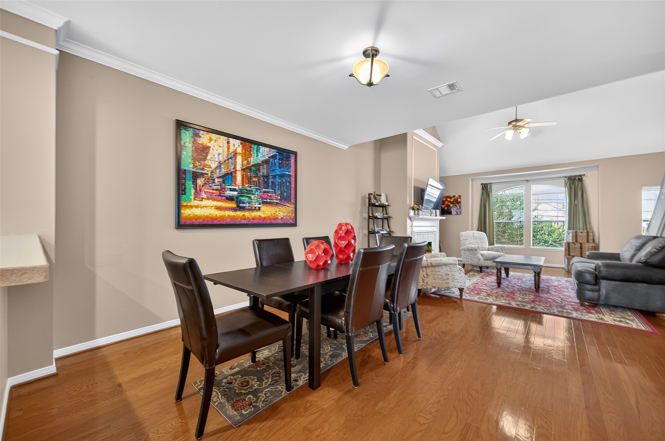 2913 West Dallas Street Houston, TX 77019 - Photo 3 of 34 a view of a dining room with furniture window and wooden floor