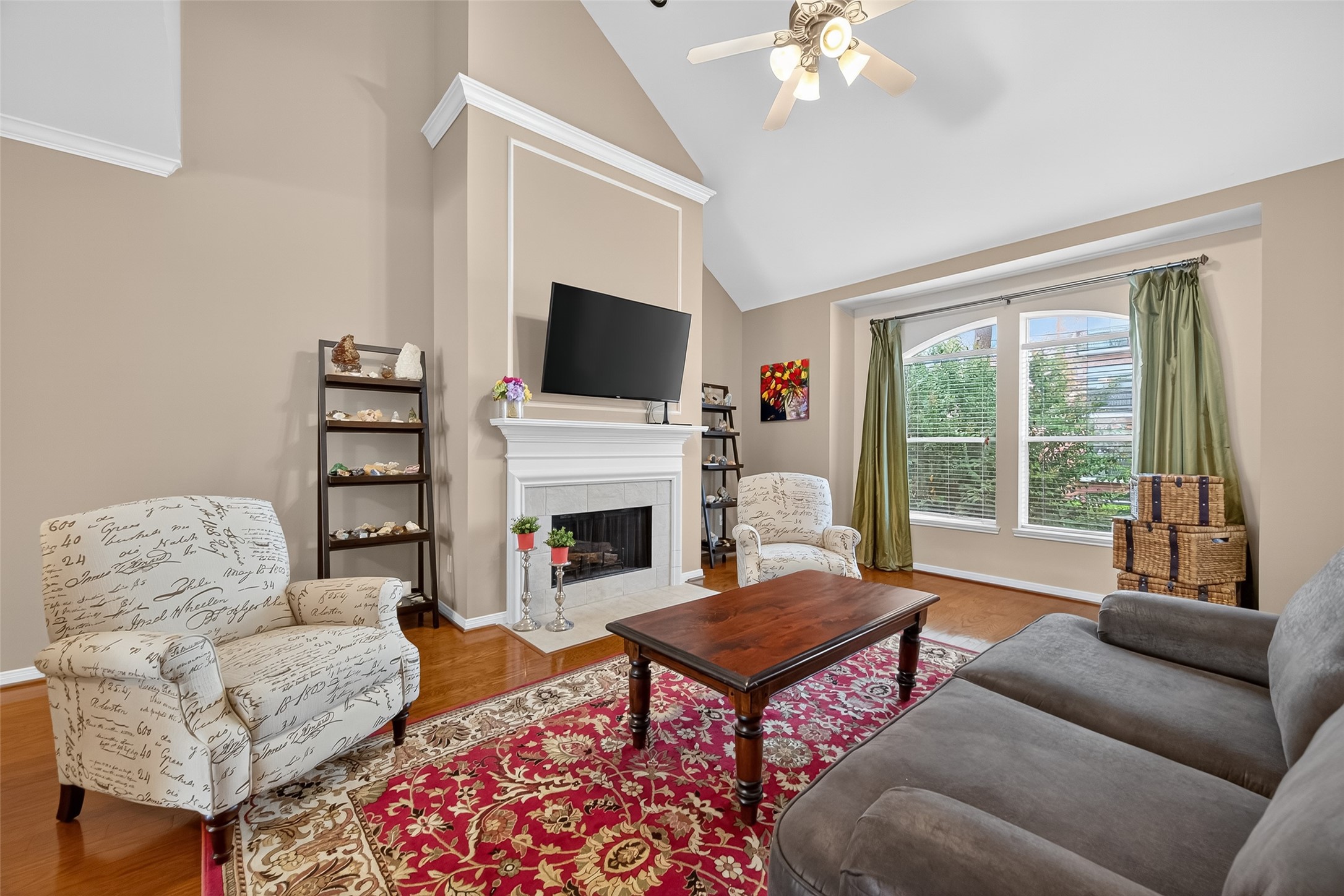 2913 West Dallas Street Houston, TX 77019 - Photo 4 of 34 a living room with furniture a flat screen tv and a fireplace