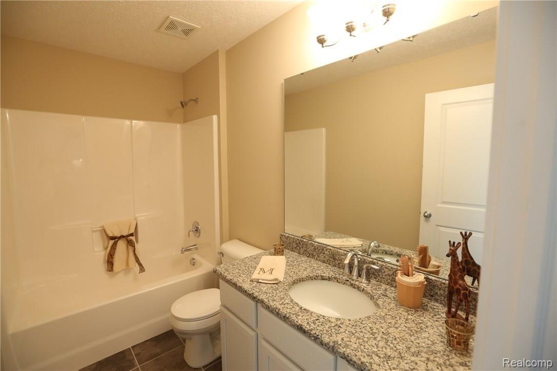481 Hosta, Unit 85 Howell, MI 48843 - Photo 12 of 23 Please note, pictures are from a different condominium with identical floor plan!