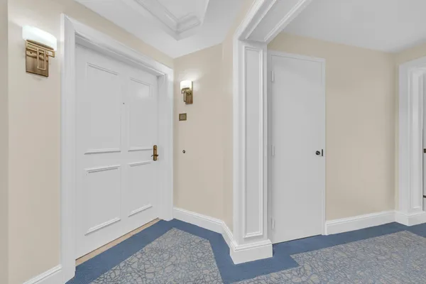 a large kitchen with cabinets a sink and appliances