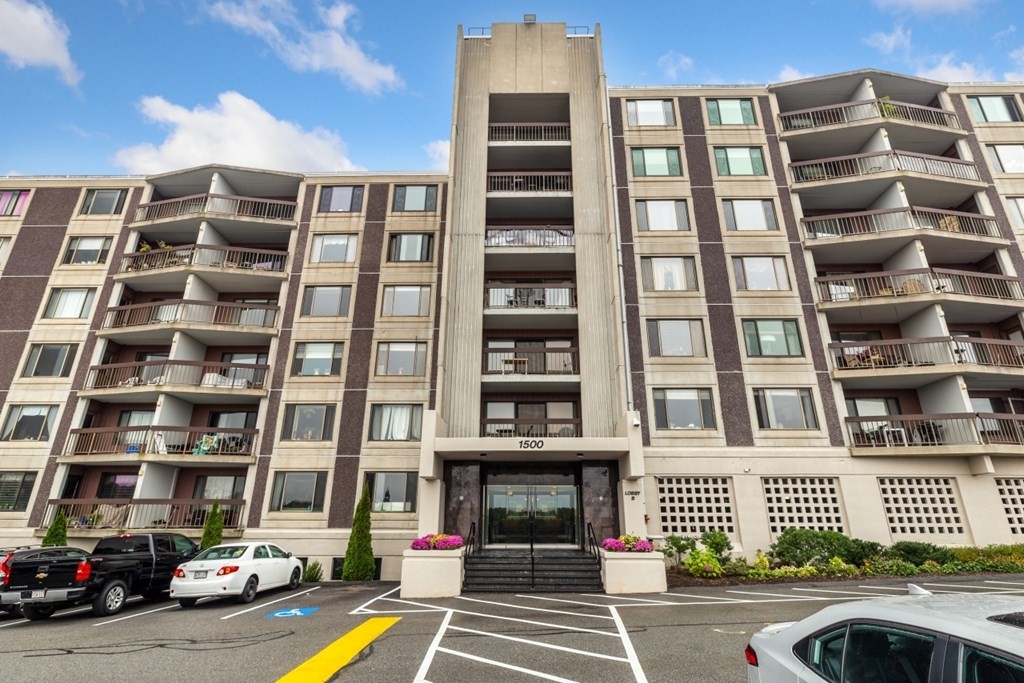 a front view of a building with glass windows