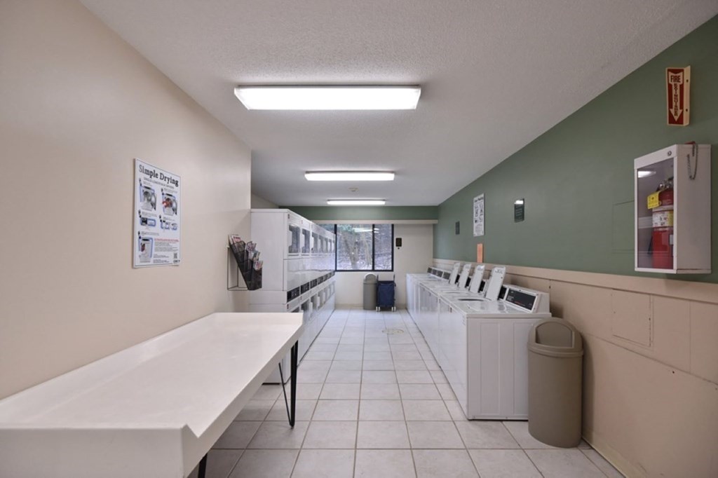 1500 Worcester Road, Unit 321 Framingham, MA 01702 - Photo 38 of 42 a living room with furniture