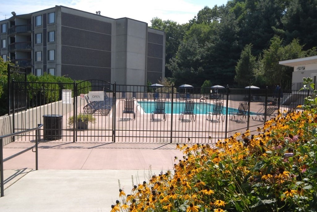 1500 Worcester Road, Unit 321 Framingham, MA 01702 - Photo 41 of 42 a view of a building with a fence