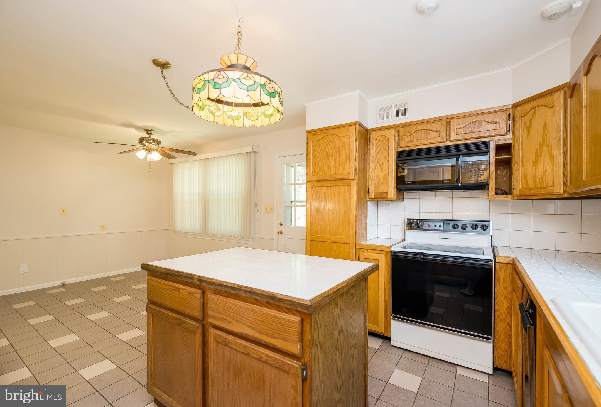 1701 Pot Spring Road Lutherville-Timonium, MD 21093 - Photo 13 of 29 Kitchen with Door to Patio