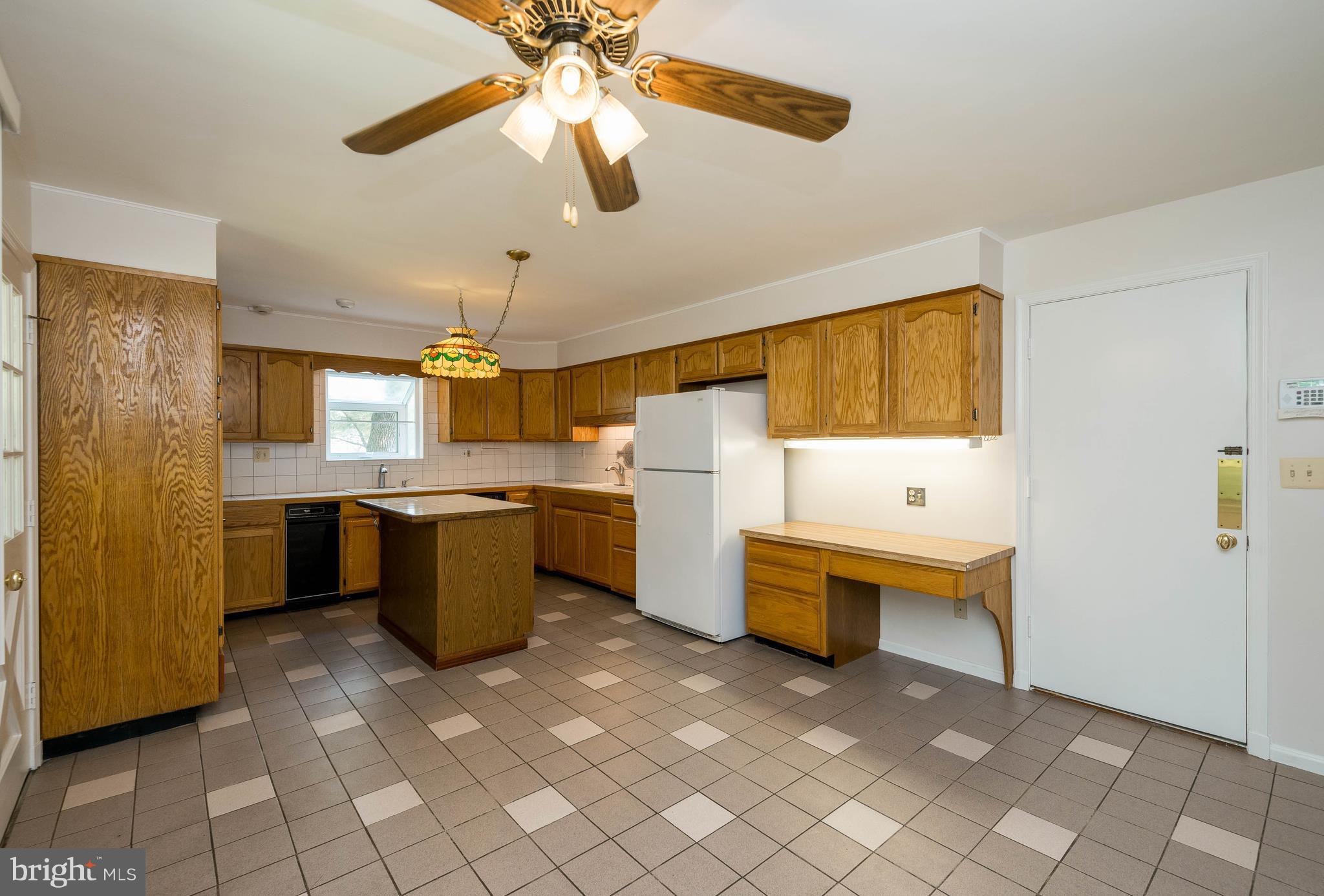 1701 Pot Spring Road Lutherville-Timonium, MD 21093 - Photo 10 of 29 Kitchen with Island & Built-in Desk Area