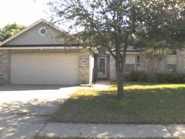 2317 Raintree Path Round Rock, TX 78664 - Photo 1 of 1 a front view of a house with a yard