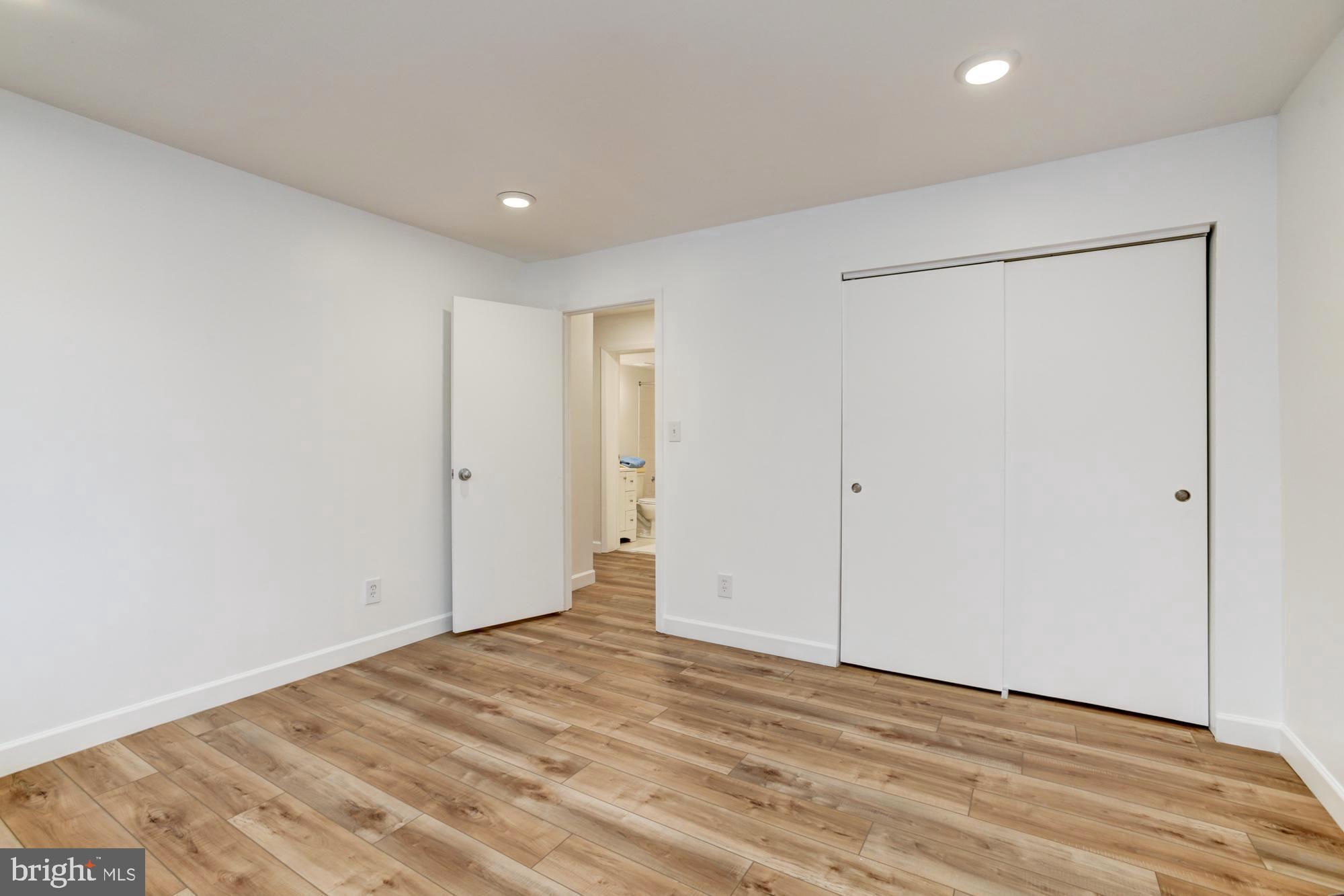 8002 Valley Manor Road, Unit 2B Owings Mills, MD 21117 - Photo 21 of 25 Second bedroom w/nice size closet, recessed lights