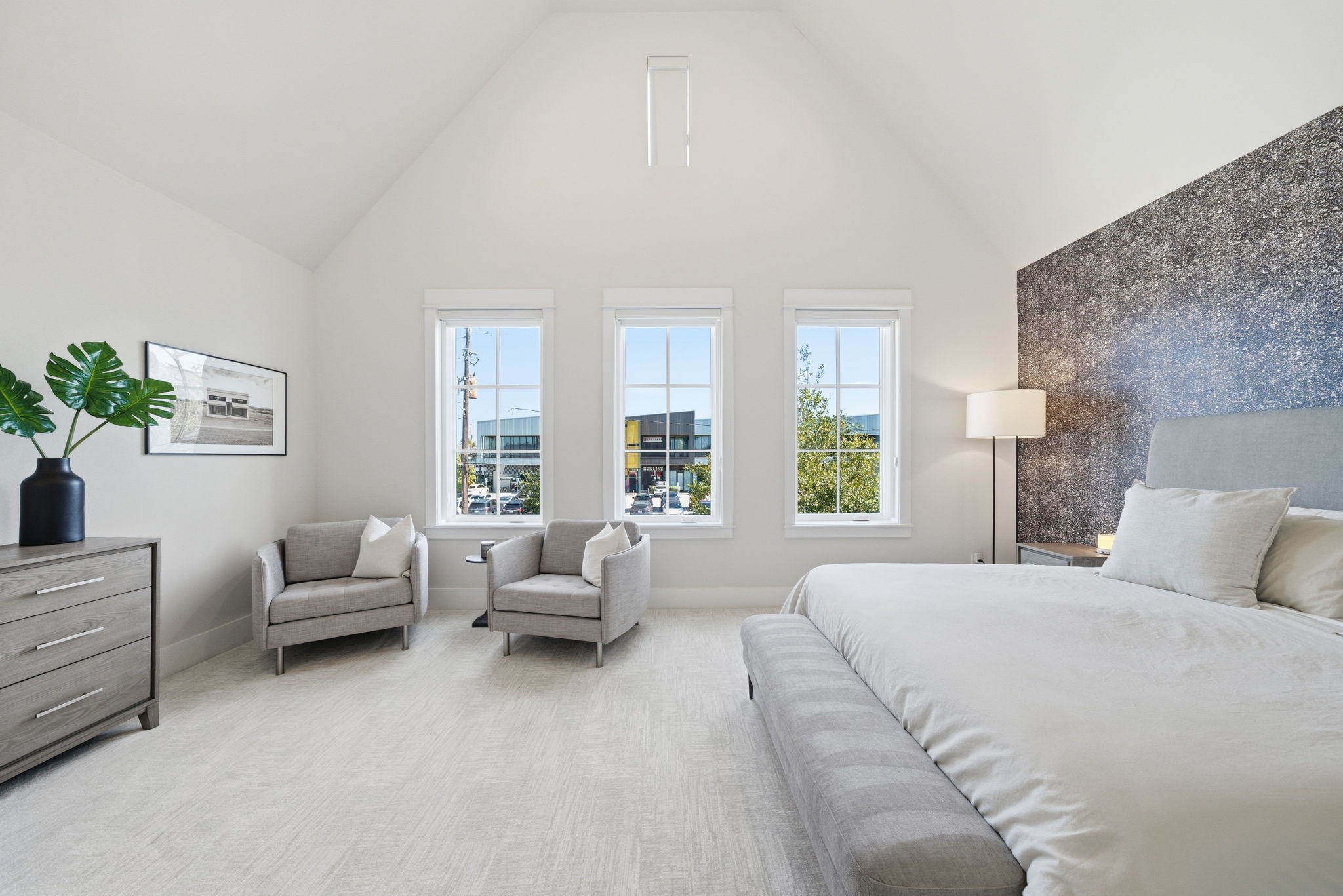 1529 Laird Street Houston, TX 77008 - Photo 14 of 31 a bedroom with a bed and windows