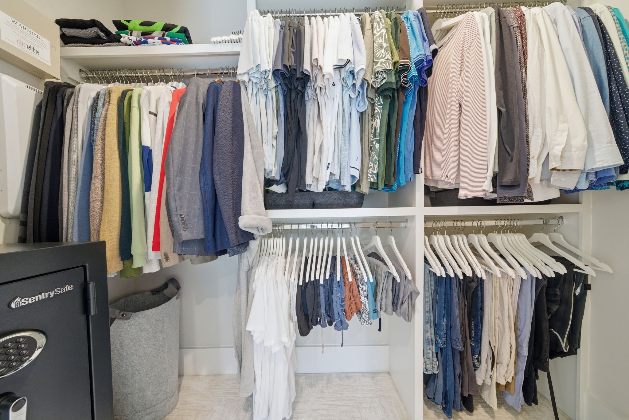 1529 Laird Street Houston, TX 77008 - Photo 19 of 31 a view of walk in closet with clothes and shoes