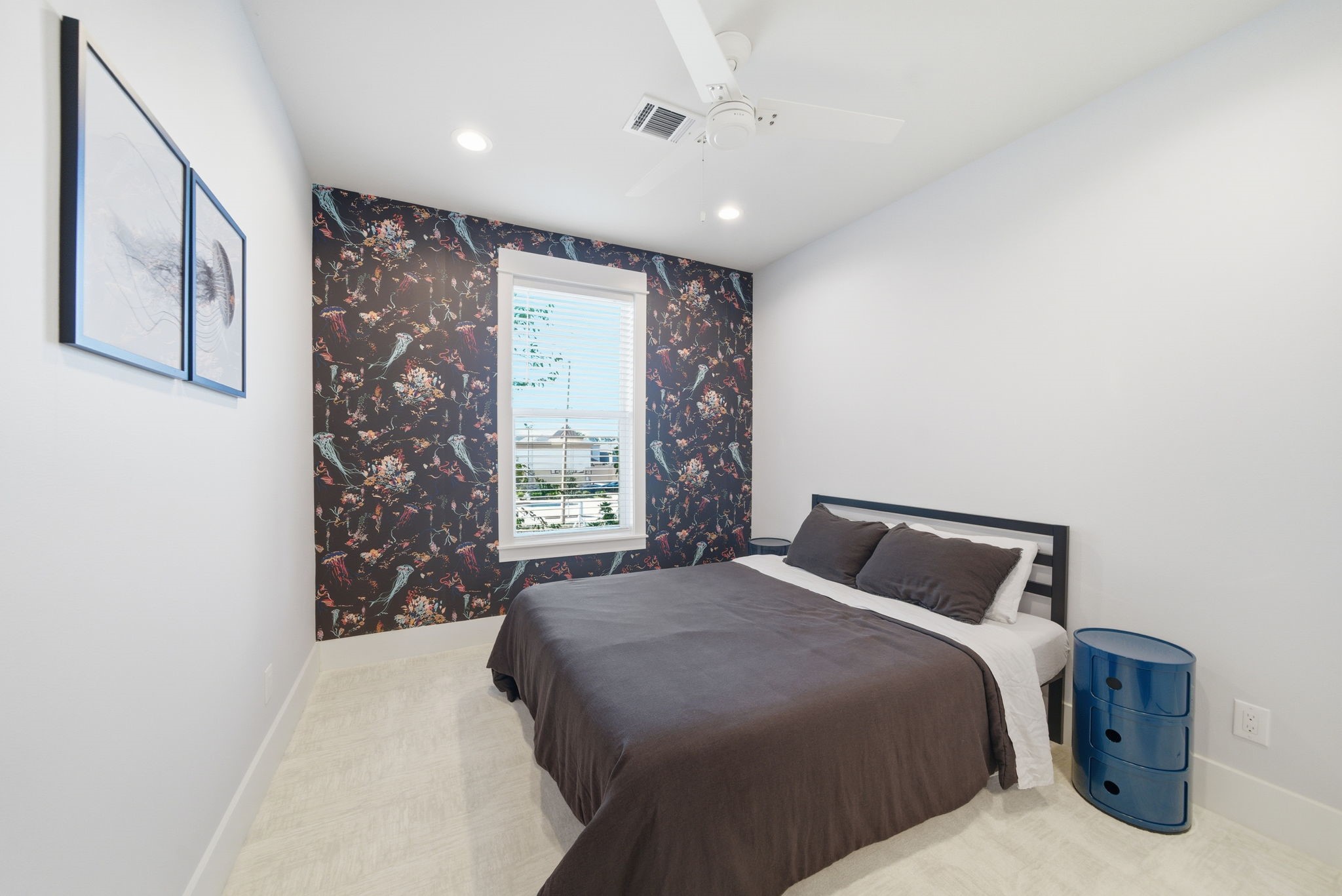 1529 Laird Street Houston, TX 77008 - Photo 25 of 31 a bedroom with a large bed and a window
