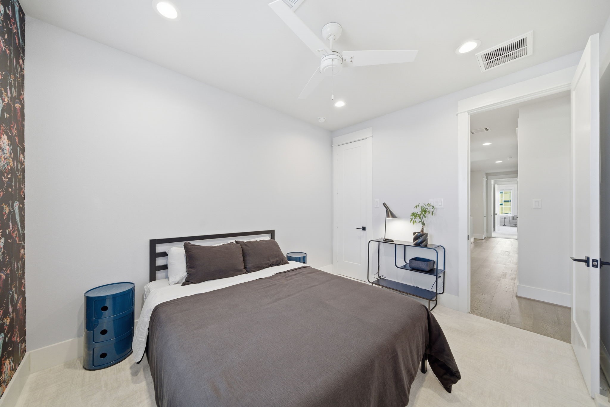 1529 Laird Street Houston, TX 77008 - Photo 26 of 31 a bedroom with a bed and a table