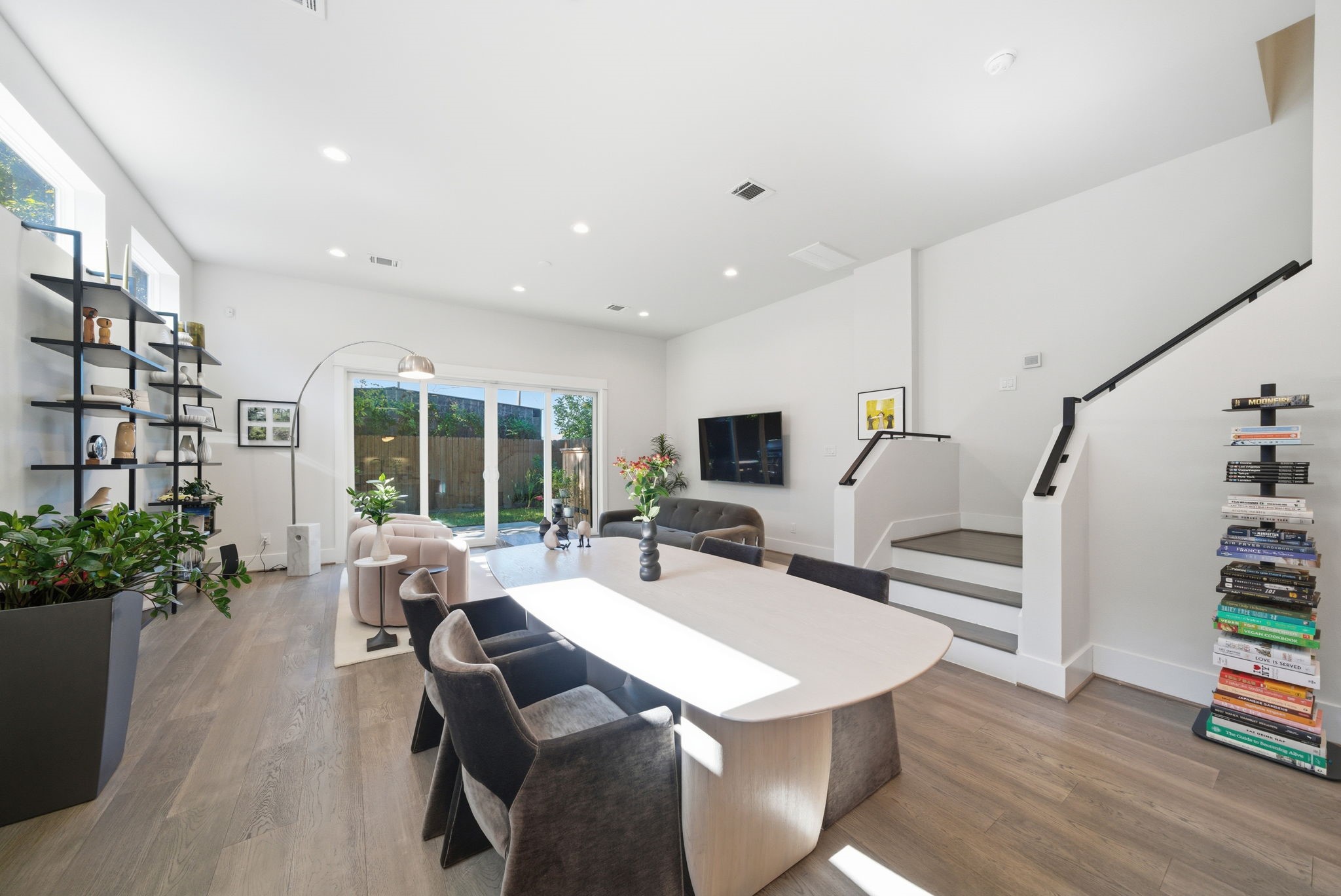1529 Laird Street Houston, TX 77008 - Photo 3 of 31 a living room with furniture and a potted plant