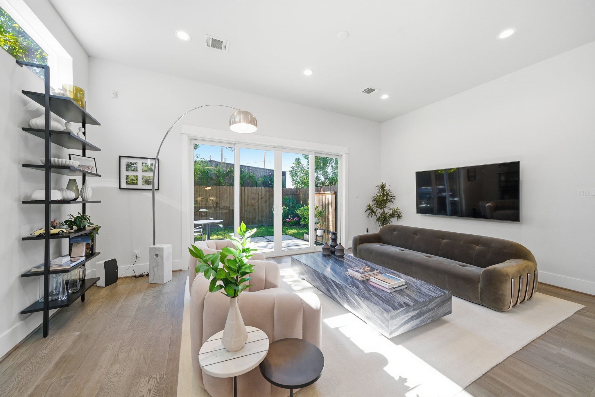 1529 Laird Street Houston, TX 77008 - Photo 6 of 31 a living room with furniture and a large window