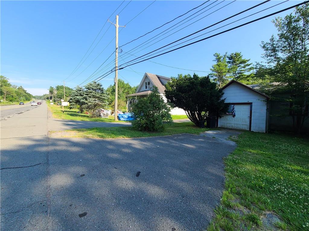 269 State Rt 17B Monticello, NY 12701 - Photo 12 of 18 View of yard with a garage and an outbuilding