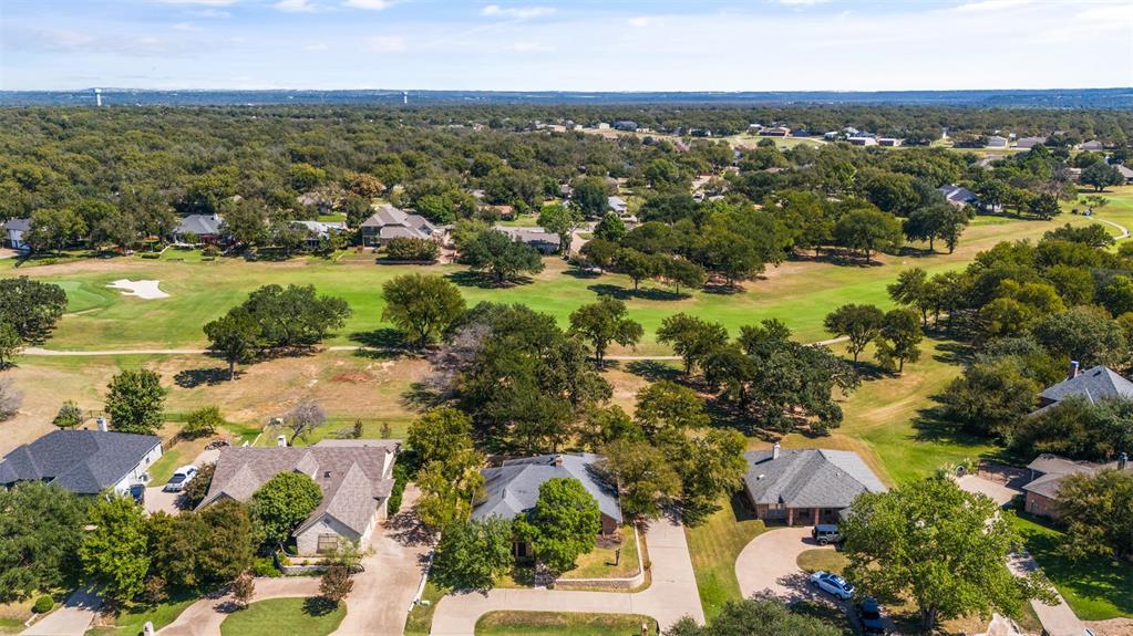 8919 Bontura Road Granbury, TX 76049 - Photo 26 of 35 an aerial view of residential houses with outdoor space and river