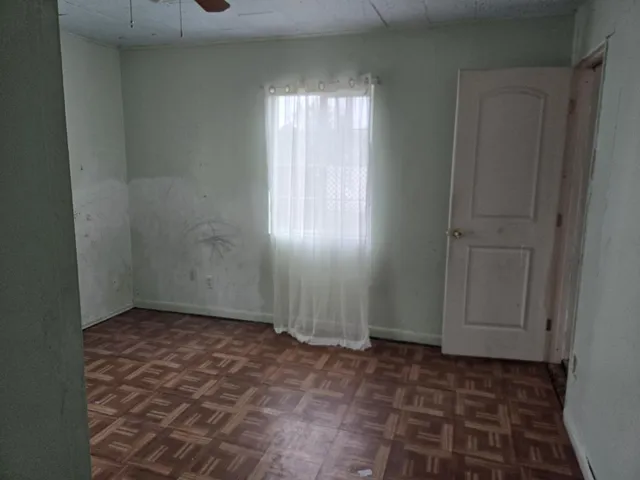 a view of an empty room and window