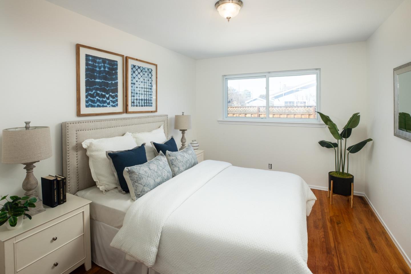 2545 Austin Place Santa Clara, CA 95050 - Photo 13 of 21 a bedroom with a bed and a window