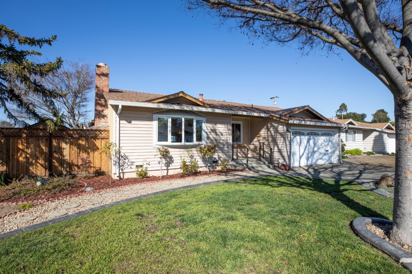 2545 Austin Place Santa Clara, CA 95050 - Photo 2 of 21 a front view of a house with a yard