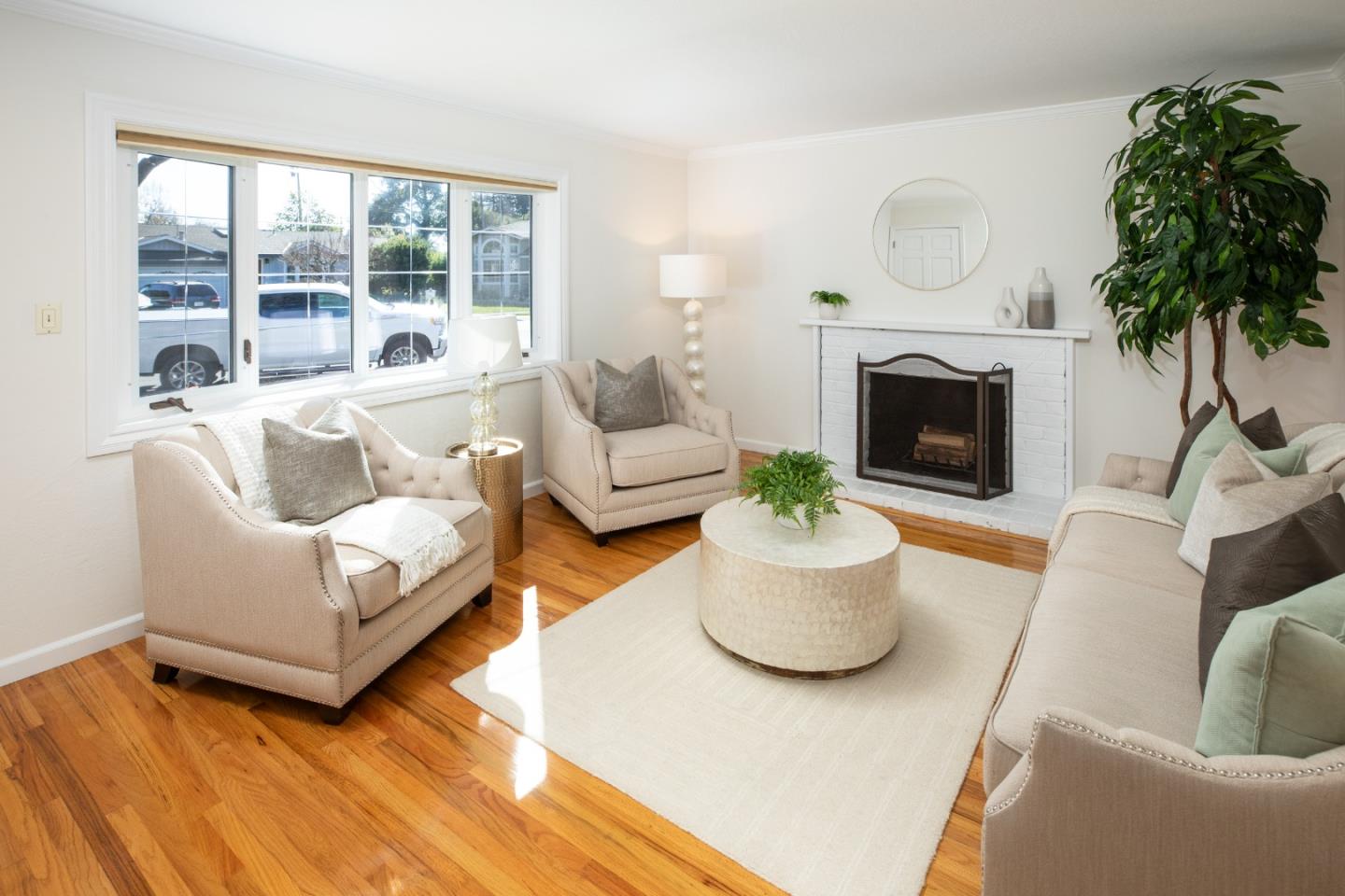 2545 Austin Place Santa Clara, CA 95050 - Photo 4 of 21 a living room with furniture a fireplace and a potted plant