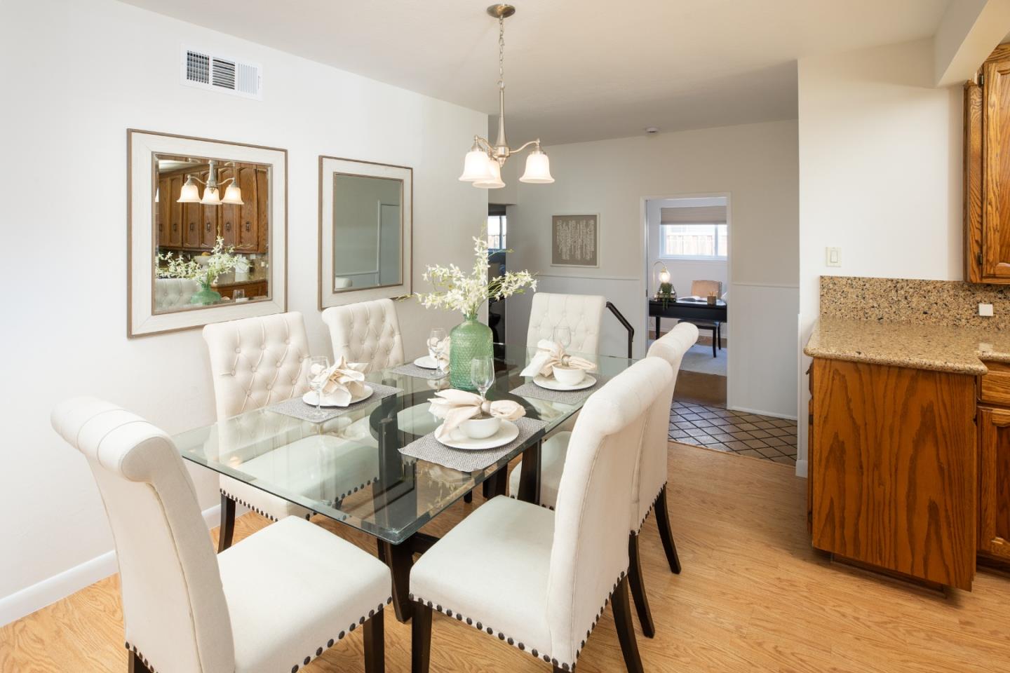 2545 Austin Place Santa Clara, CA 95050 - Photo 8 of 21 a view of a dining room with furniture window and wooden floor
