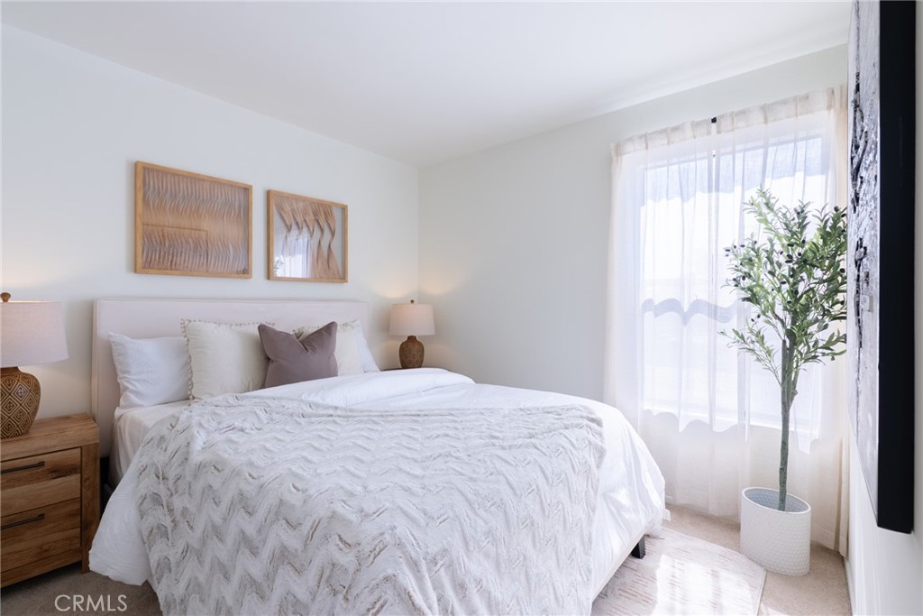 1024 West Lamark Lane Anaheim, CA 92802 - Photo 20 of 34 a bedroom with a bed and a window