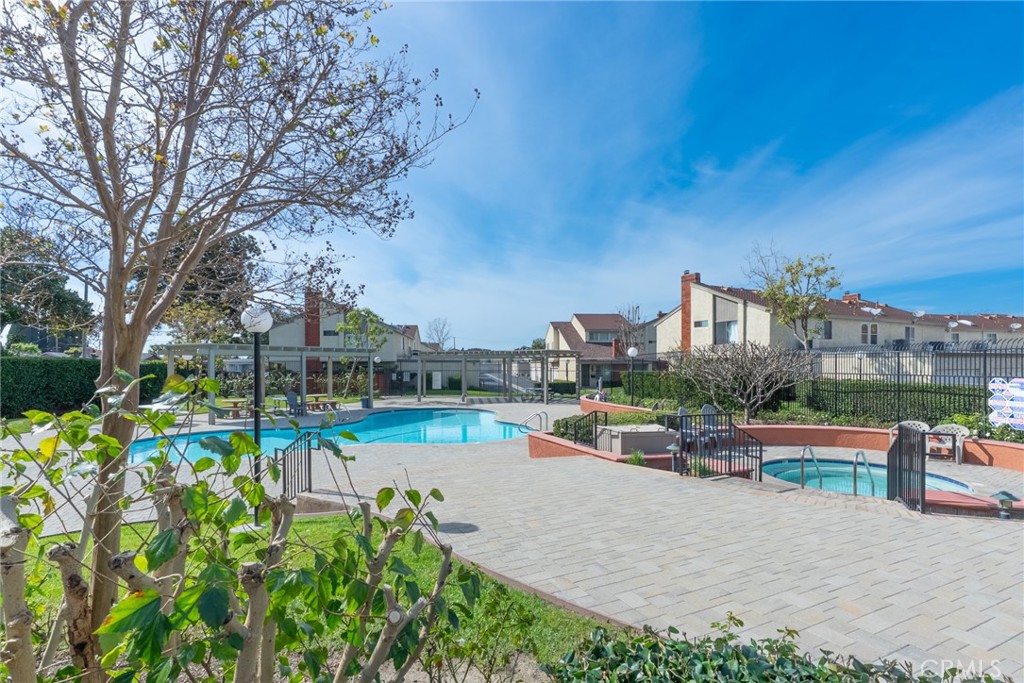 1024 West Lamark Lane Anaheim, CA 92802 - Photo 28 of 34 a view of a swimming pool with a patio
