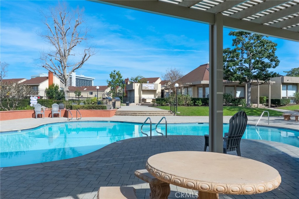 1024 West Lamark Lane Anaheim, CA 92802 - Photo 29 of 34 a view of a swimming pool with a patio