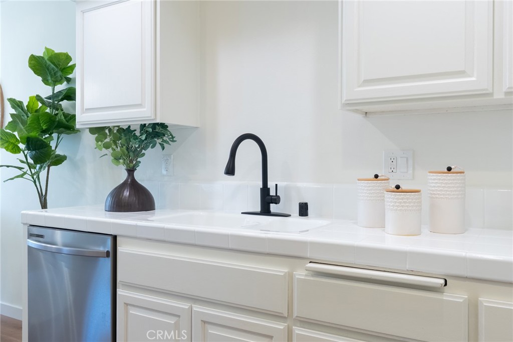 1024 West Lamark Lane Anaheim, CA 92802 - Photo 8 of 34 a close view of sink and a potted plant