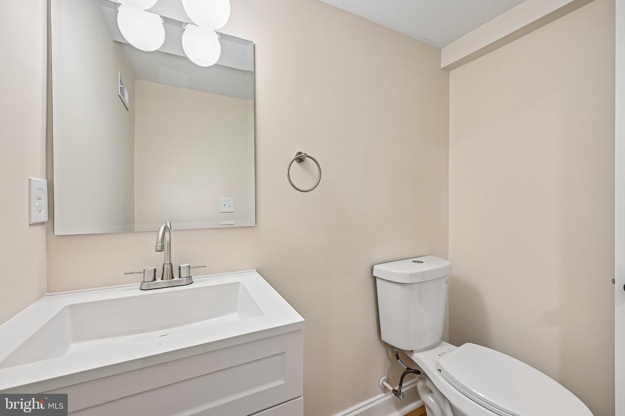 5714 Rusk Avenue Baltimore, MD 21215 - Photo 40 of 51 Sleek modern bathroom with elegance.
