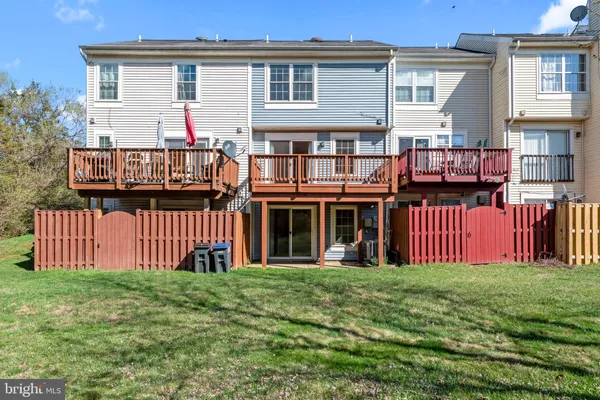 a front view of house with yard and seating area