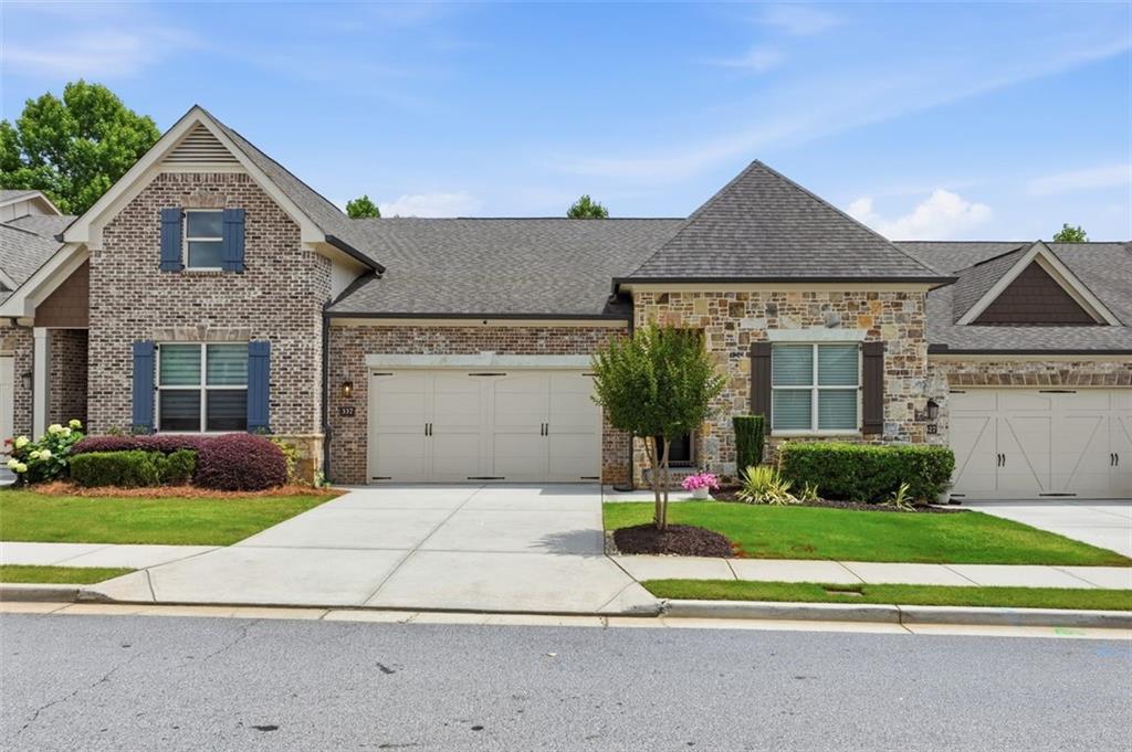 337 Rosshandler Road Suwanee, GA 30024 - Photo 1 of 45 a front view of a house with a yard