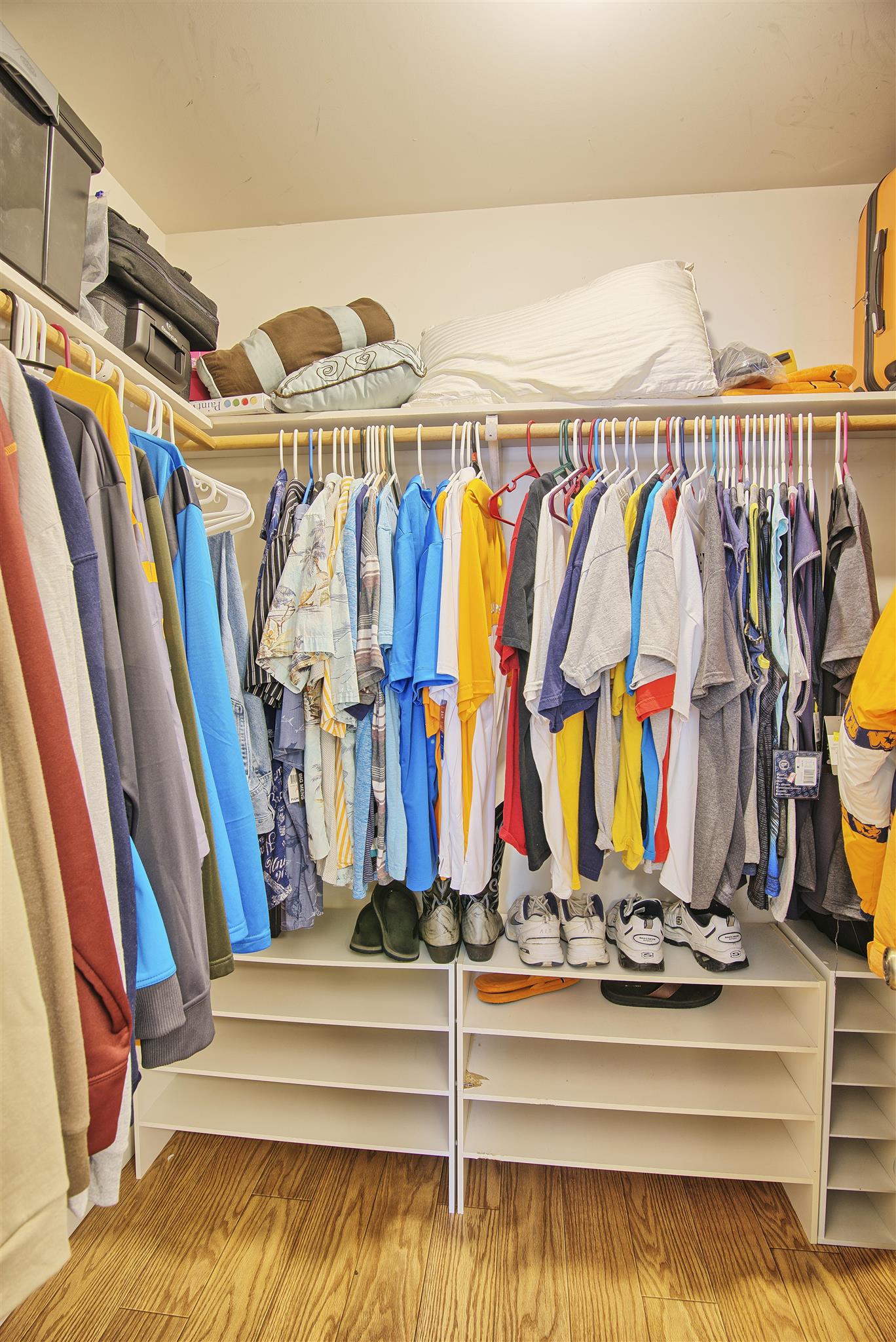 7511 Cherokee Hills Road Fairview, TN 37062 - Photo 13 of 18 a view of walk in closet with clothes and shoes