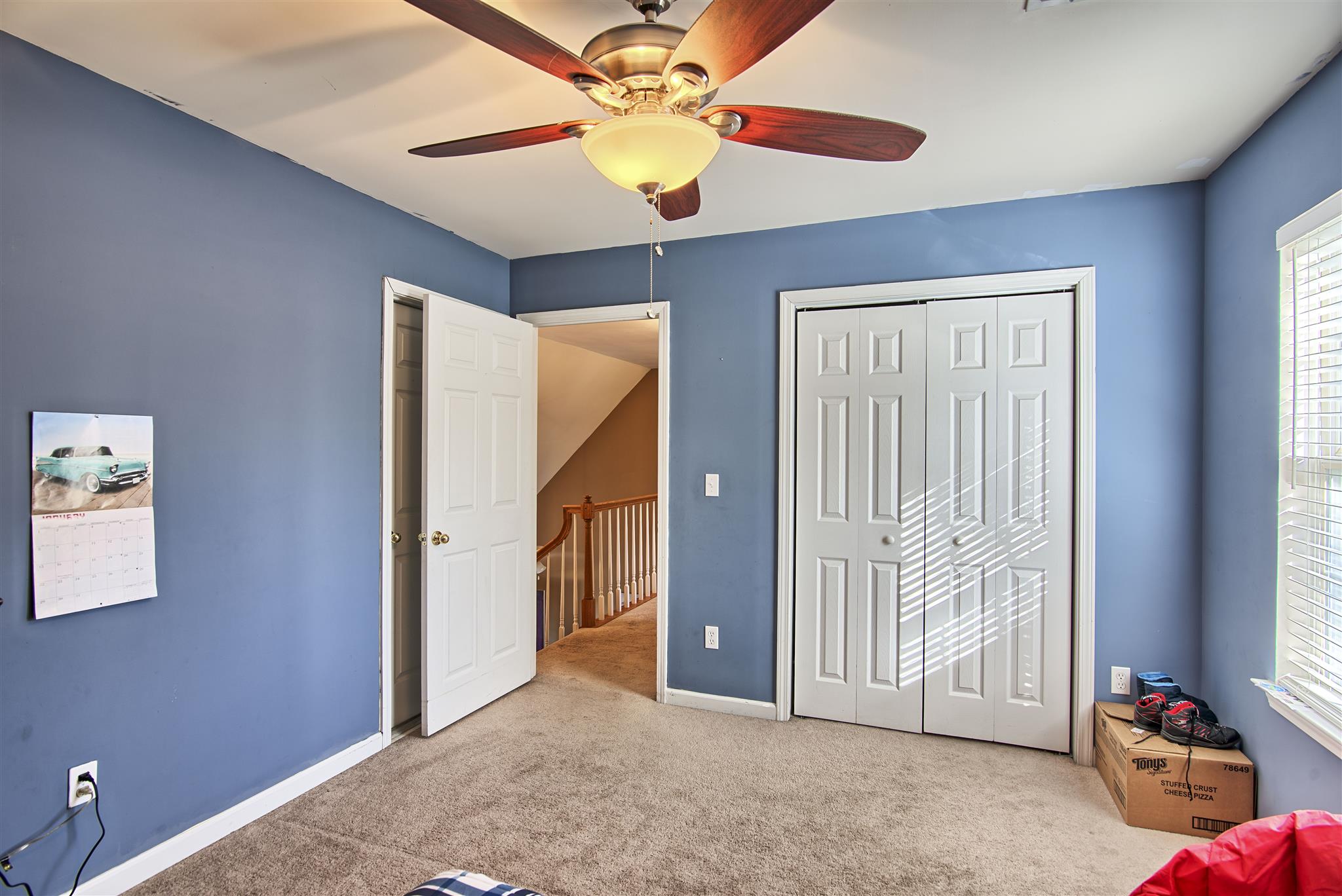 7511 Cherokee Hills Road Fairview, TN 37062 - Photo 15 of 18 a view of livingroom with hardwood floor and a ceiling fan