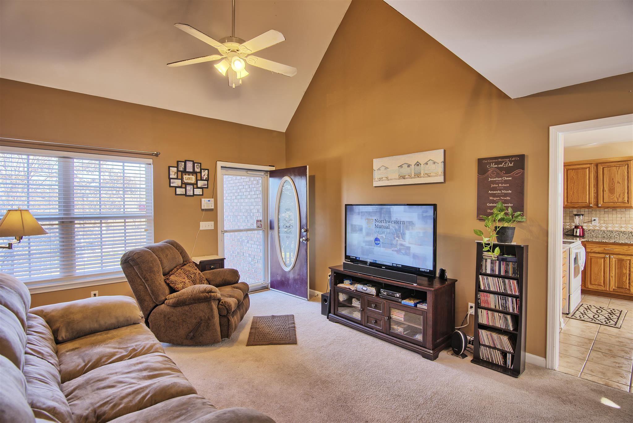 7511 Cherokee Hills Road Fairview, TN 37062 - Photo 4 of 18 a living room with furniture and a flat screen tv