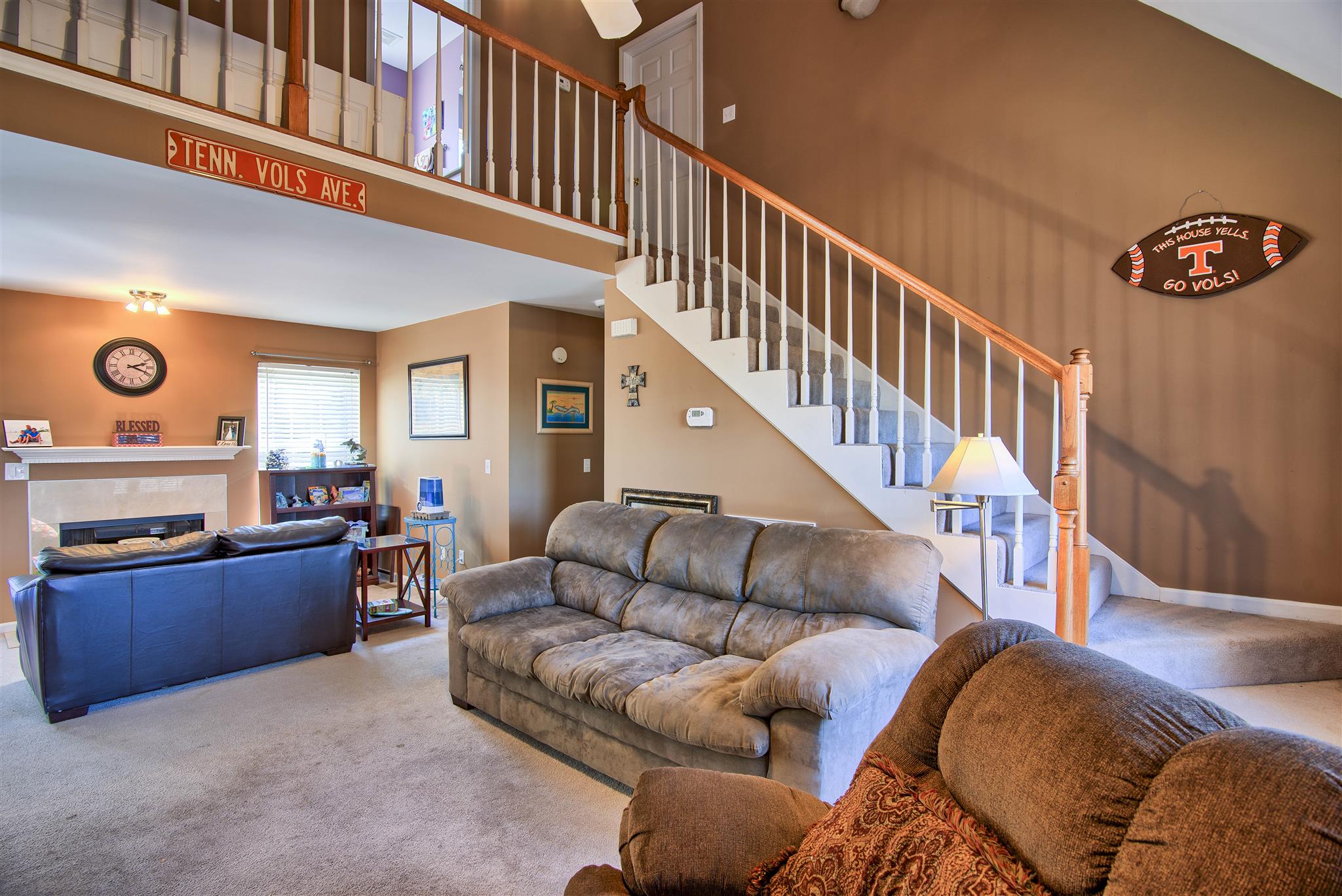 7511 Cherokee Hills Road Fairview, TN 37062 - Photo 5 of 18 a living room with furniture windows and a rug