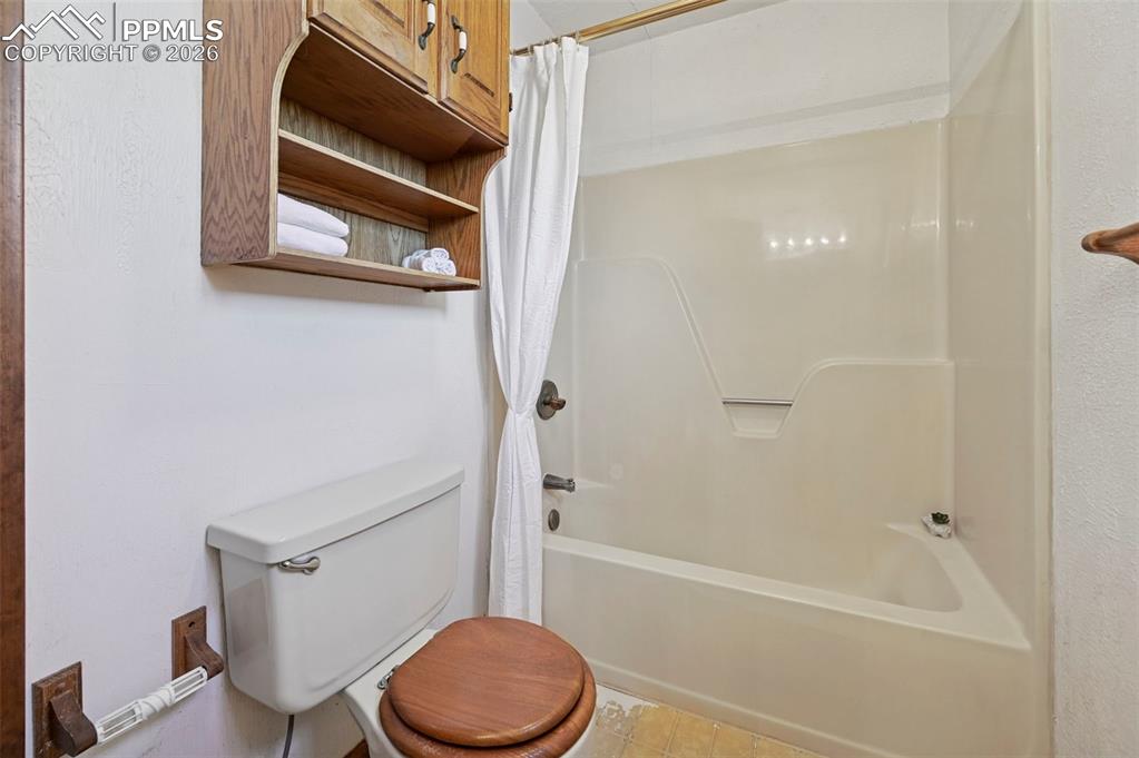 109 Second Street Ramah, CO 80832 - Photo 21 of 39 a bathroom with a toilet and a bathtub