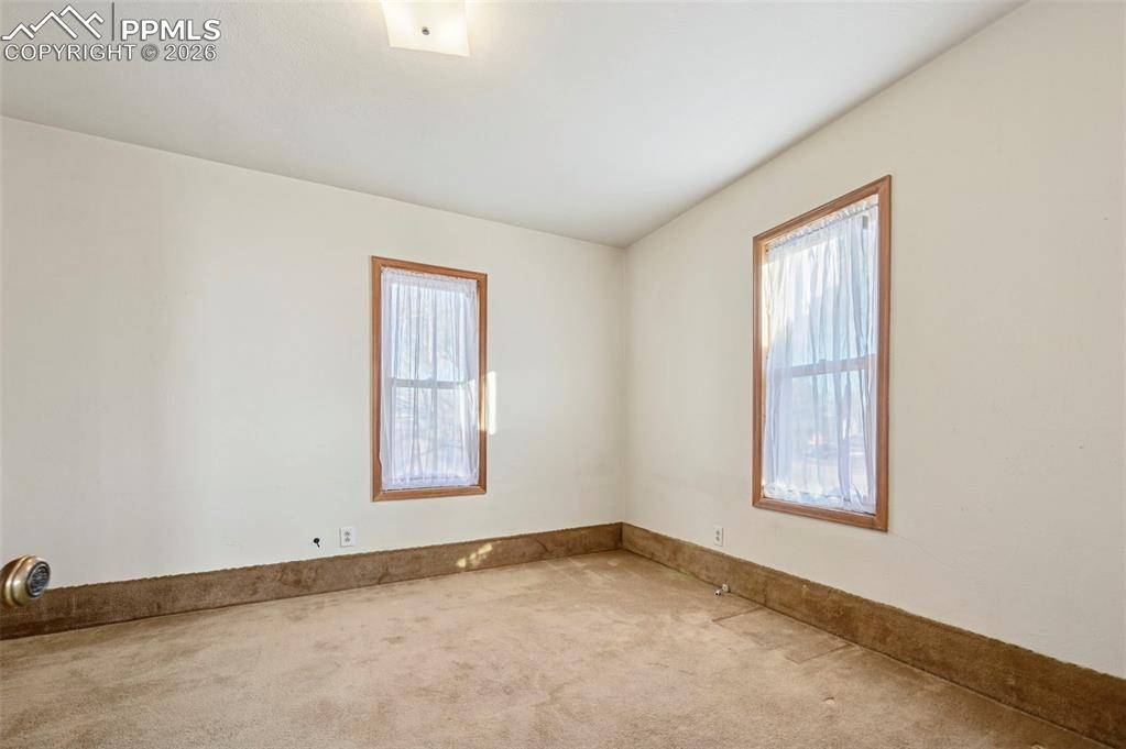 109 Second Street Ramah, CO 80832 - Photo 23 of 39 an empty room with windows and closet