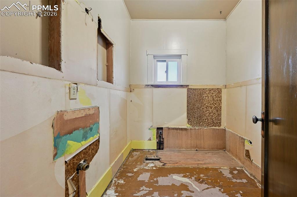 109 Second Street Ramah, CO 80832 - Photo 25 of 39 a bathroom with a sink a toilet and a window